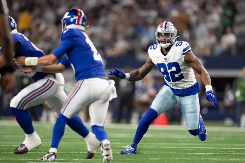 Dallas Cowboys defensive end Dorance Armstrong (92) rushes in during the second half of an NFL football game between the Dallas Cowboys and the New York Giants, Sunday, Nov. 12, 2023, in Arlington, Texas. The Cowboys won 49-17. (AP Photo/Julio Cortez)