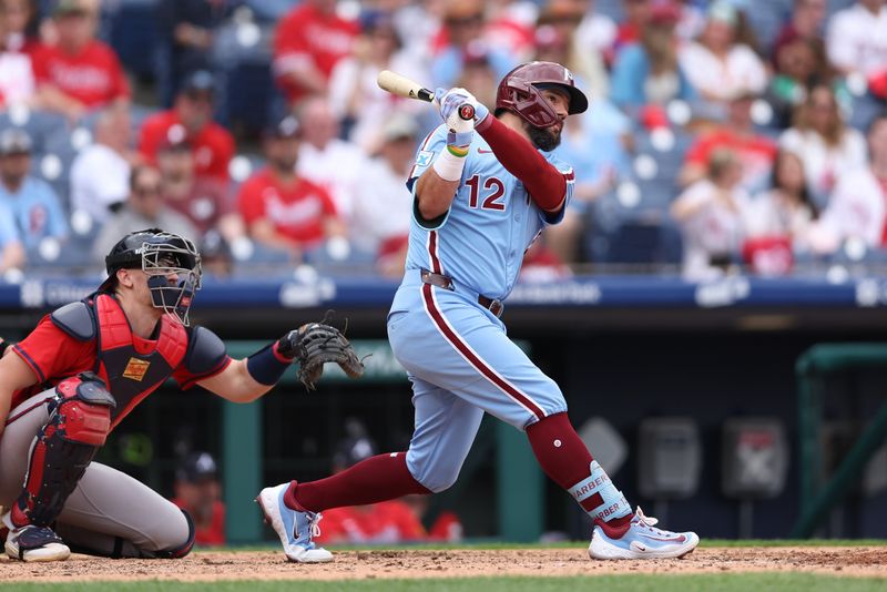 May 29, 2025; Philadelphia, Pennsylvania, USA; Philadelphia Phillies outfielder Kyle Schwarber (12) hits a home run during the seventh inning against the Atlanta Braves at Citizens Bank Park. Mandatory Credit: Bill Streicher-Imagn Images