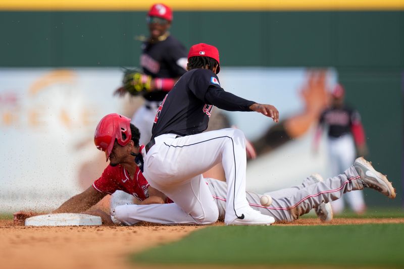 Feb. 24, 2024; Goodyear, Arizona, USA; Cincinnati Reds outfielder Bubba Thompson steals second base in the eighth inning during a MLB spring training baseball game against the Cleveland Guardians at Goodyear Ballpark. Mandatory Credit: Kareem Elgazzar-USA TODAY Sports