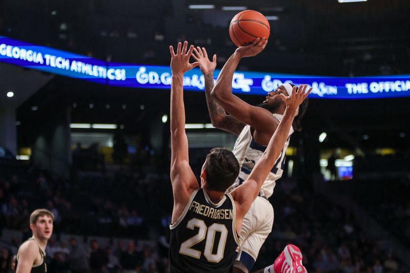 Feb 6, 2024; Atlanta, Georgia, USA; Georgia Tech Yellow Jackets guard Amaree Abram (24) shoots past Wake Forest Demon Deacons guard Parker Friedrichsen (20) in the second half at McCamish Pavilion. Mandatory Credit: Brett Davis-USA TODAY Sports
