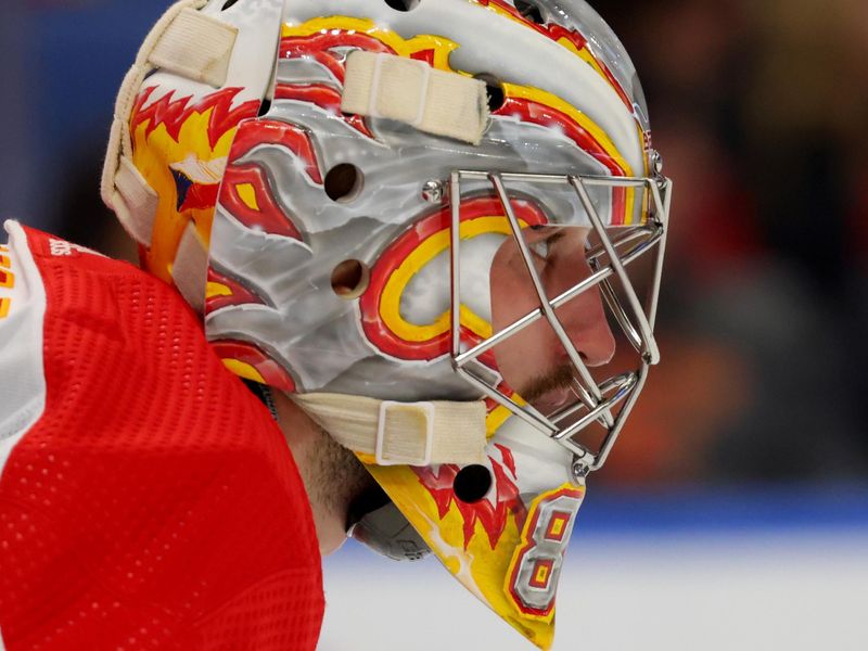 Oct 19, 2023; Buffalo, New York, USA;  Calgary Flames goaltender Dan Vladar (80) watches for the puck during the second period against the Buffalo Sabres at KeyBank Center. Mandatory Credit: Timothy T. Ludwig-USA TODAY Sports