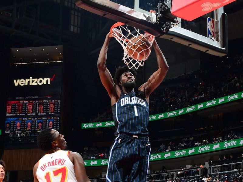 ATLANTA, GA - JANUARY 17: Jonathan Isaac #1 of the Orlando Magic goes to the basket during the game on January 17, 2024 at State Farm Arena in Atlanta, Georgia.  NOTE TO USER: User expressly acknowledges and agrees that, by downloading and/or using this Photograph, user is consenting to the terms and conditions of the Getty Images License Agreement. Mandatory Copyright Notice: Copyright 2024 NBAE (Photo by Scott Cunningham/NBAE via Getty Images)