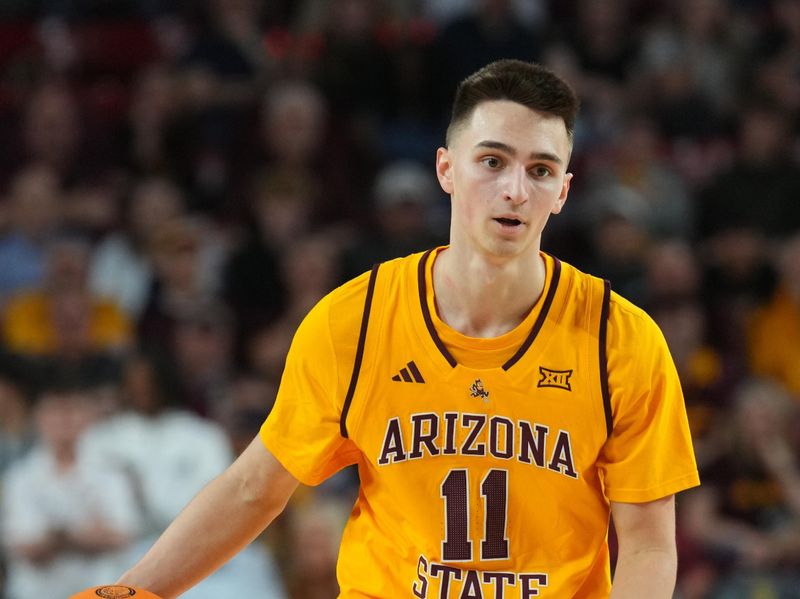 Feb 26, 2025; Tempe, Arizona, USA; Arizona State Sun Devils guard Bobby Hurley (11) dribbles against the Brigham Young Cougars during the first half at Desert Financial Arena. Mandatory Credit: Joe Camporeale-Imagn Images
