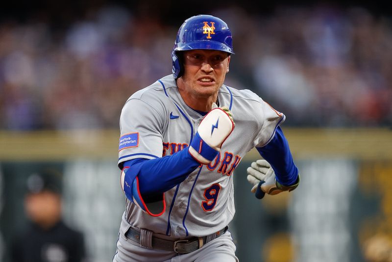 May 26, 2023; Denver, Colorado, USA; New York Mets center fielder Brandon Nimmo (9) runs to third on a triple in the fifth inning against the Colorado Rockies at Coors Field. Mandatory Credit: Isaiah J. Downing-USA TODAY Sports