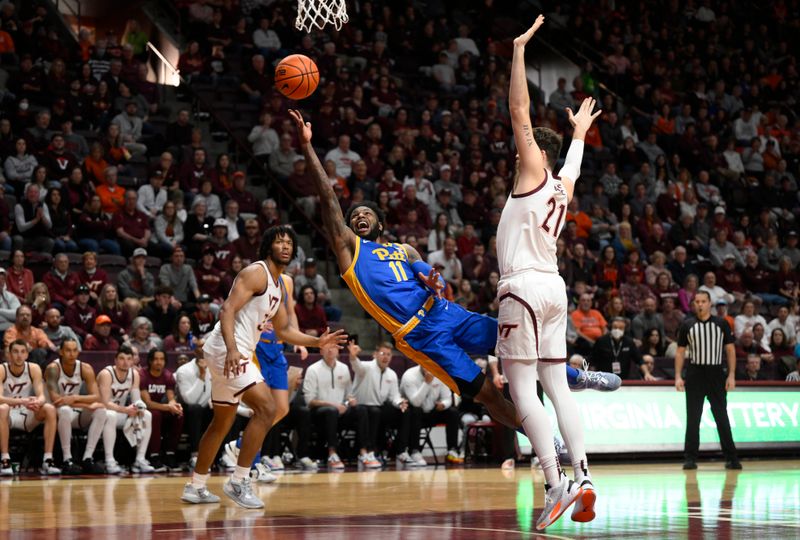 Feb 18, 2023; Blacksburg, Virginia, USA;  Pittsburgh Panthers guard Jamarius Burton (11) drives to the basket past Virginia Tech Hokies forward Grant Basile (21) in the first half at Cassell Coliseum. Mandatory Credit: Lee Luther Jr.-USA TODAY Sports