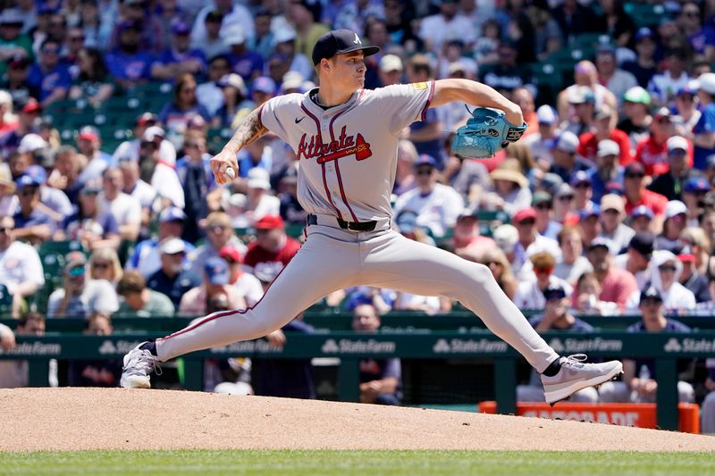 May 23, 2024; Chicago, Illinois, USA; Atlanta Braves pitcher AJ Smith-Shawver (32) pitches against the Chicago Cubs during the first inning at Wrigley Field. Mandatory Credit: David Banks-USA TODAY Sports