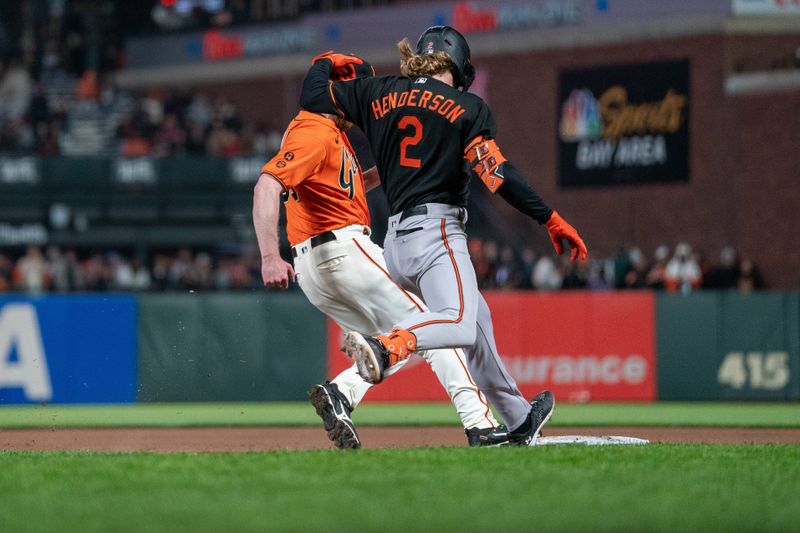 Jun 2, 2023; San Francisco, California, USA;  San Francisco Giants relief pitcher John Brebbia (59) forces out Baltimore Orioles third baseman Gunnar Henderson (2) during the ninth inning at Oracle Park. Mandatory Credit: Neville E. Guard-USA TODAY Sports