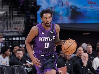 SACRAMENTO, CA - DECEMBER 16: Malik Monk #0 of the Sacramento Kings dribbles the ball during the game against the Utah Jazz on December 16, 2023 at Golden 1 Center in Sacramento, California. NOTE TO USER: User expressly acknowledges and agrees that, by downloading and or using this Photograph, user is consenting to the terms and conditions of the Getty Images License Agreement. Mandatory Copyright Notice: Copyright 2023 NBAE (Photo by Rocky Widner/NBAE via Getty Images)