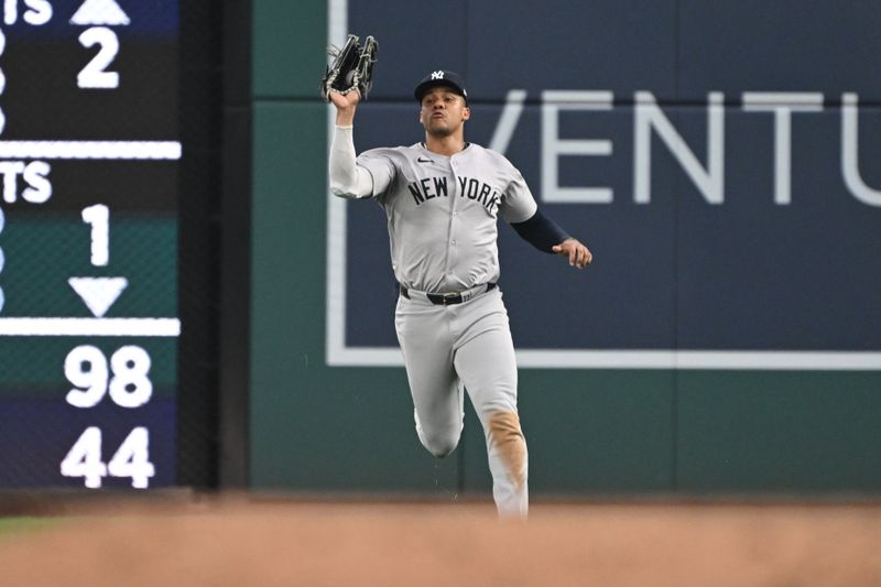 Aug 26, 2024; Washington, District of Columbia, USA; New York Yankees right fielder Juan Soto (22) catches the ball for an out in the outfield against the Washington Nationals during the second inning at Nationals Park. Mandatory Credit: Rafael Suanes-USA TODAY Sports