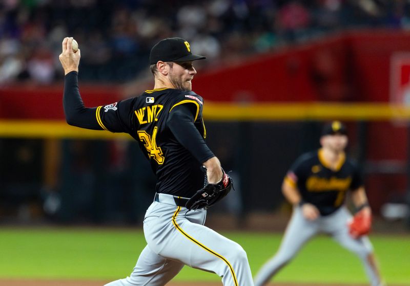May 27, 2025; Phoenix, Arizona, USA; Pittsburgh Pirates pitcher Joey Wentz in the eighth inning against the Arizona Diamondbacks at Chase Field. Mandatory Credit: Mark J. Rebilas-Imagn Images