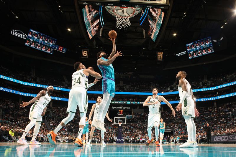 CHARLOTTE, NC - FEBRUARY 29: Nick Richards #4 of the Charlotte Hornets shoots the ball during the game against the Milwaukee Bucks on February 29, 2024 at Spectrum Center in Charlotte, North Carolina. NOTE TO USER: User expressly acknowledges and agrees that, by downloading and or using this photograph, User is consenting to the terms and conditions of the Getty Images License Agreement. Mandatory Copyright Notice: Copyright 2024 NBAE (Photo by Kent Smith/NBAE via Getty Images)