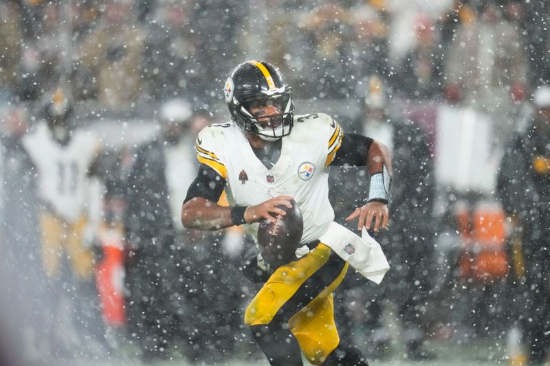 Pittsburgh Steelers quarterback Russell Wilson (3) scrambles in the second half of an NFL football game against the Cleveland Browns, Thursday, Nov. 21, 2024, in Cleveland. (AP Photo/Sue Ogrocki)