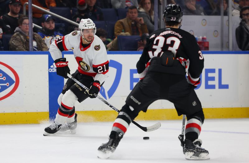 Jan 11, 2024; Buffalo, New York, USA;  Ottawa Senators right wing Mathieu Joseph (21) looks to make a pass during the second period against the Buffalo Sabres at KeyBank Center. Mandatory Credit: Timothy T. Ludwig-USA TODAY Sports