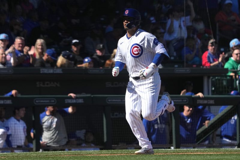 Feb 20, 2026; Mesa, Arizona, USA; Chicago Cubs right fielder Seiya Suzuki (27) hits a homerun against the Chicago White Sox in the first inning at Sloan Park. Mandatory Credit: Rick Scuteri-Imagn Images