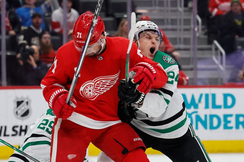 Jan 23, 2024; Detroit, Michigan, USA;  Detroit Red Wings center Dylan Larkin (71) and Dallas Stars center Roope Hintz (24) fight for position in front of Dallas Stars goaltender Jake Oettinger (29) in the second period at Little Caesars Arena. Mandatory Credit: Rick Osentoski-USA TODAY Sports