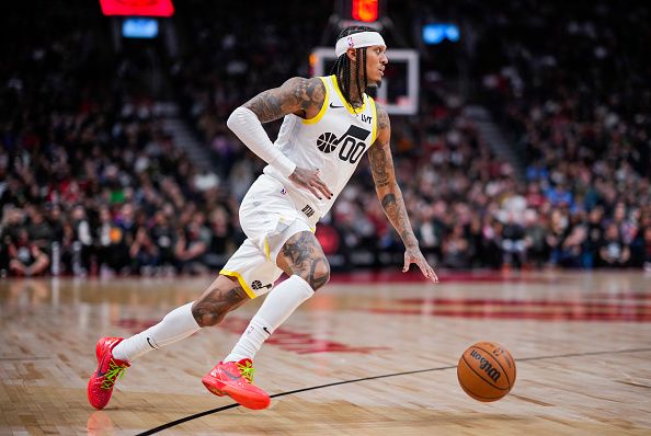 TORONTO, ON - DECEMBER 23: Jordan Clarkson #00 of the Utah Jazz dribbles against the Toronto Raptors during the second half of their basketball game at the Scotiabank Arena on December 23, 2023 in Toronto, Ontario, Canada. NOTE TO USER: User expressly acknowledges and agrees that, by downloading and/or using this Photograph, user is consenting to the terms and conditions of the Getty Images License Agreement. (Photo by Mark Blinch/Getty Images)