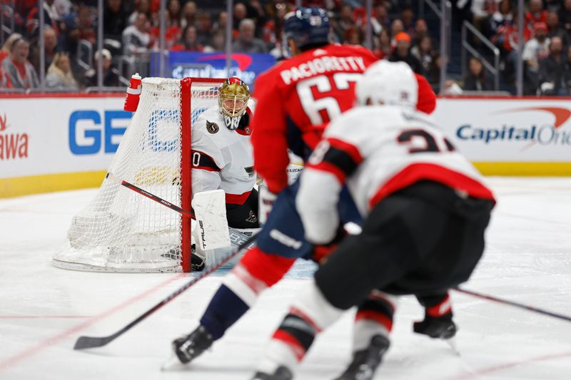 Apr 7, 2024; Washington, District of Columbia, USA; Ottawa Senators goaltender Joonas Korpisalo (70) prepares to make a save on Washington Capitals left wing Max Pacioretty (67) as Senators right wing Claude Giroux (28) chases in the third period at Capital One Arena. Mandatory Credit: Geoff Burke-USA TODAY Sports