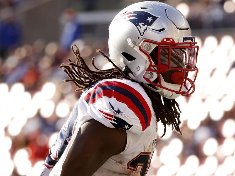 New England Patriots running back Rhamondre Stevenson (38) reacts after scoring a touchdown during an NFL football game against the Cleveland Browns, Sunday, Oct. 16, 2022, in Cleveland. (AP Photo/Kirk Irwin)