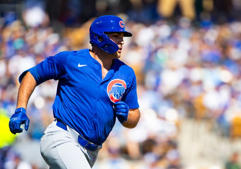 Mar 2, 2024; Phoenix, Arizona, USA; Chicago Cubs infielder Matt Mervis rounds the bases after hitting a home run against the Los Angeles Dodgers during a spring training game at Camelback Ranch-Glendale. Mandatory Credit: Mark J. Rebilas-USA TODAY Sports