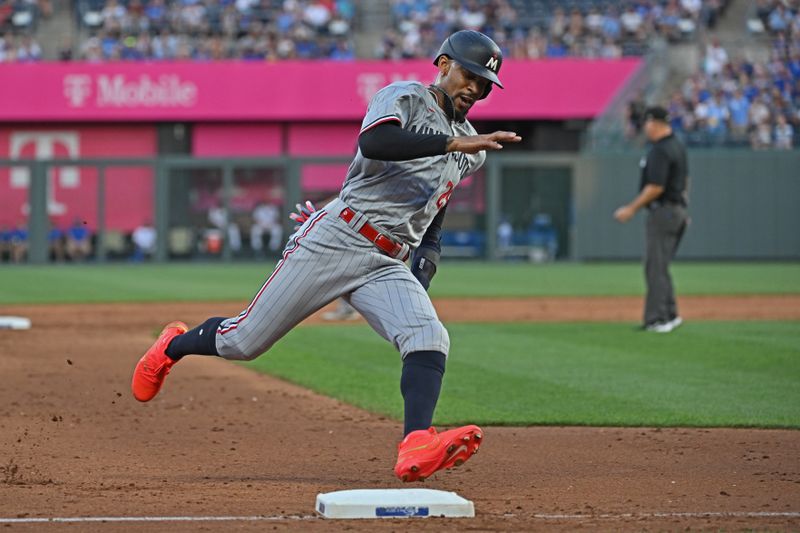 Jul 29, 2023; Kansas City, Missouri, USA;  Minnesota Twins designated hitter Byron Buxton (25) rounds third base to score a run during the sixth inning against the Kansas City Royals at Kauffman Stadium. Mandatory Credit: Peter Aiken-USA TODAY Sports