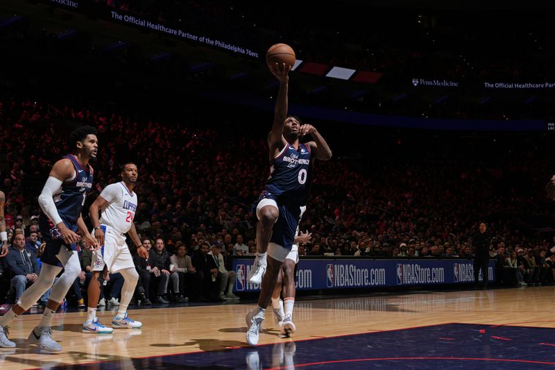 PHILADELPHIA, PA - MARCH 27: Tyrese Maxey #0 of the Philadelphia 76ers drives to the basket during the game against the LA Clippers on March 27, 2024 at the Wells Fargo Center in Philadelphia, Pennsylvania NOTE TO USER: User expressly acknowledges and agrees that, by downloading and/or using this Photograph, user is consenting to the terms and conditions of the Getty Images License Agreement. Mandatory Copyright Notice: Copyright 2024 NBAE (Photo by Jesse D. Garrabrant/NBAE via Getty Images)