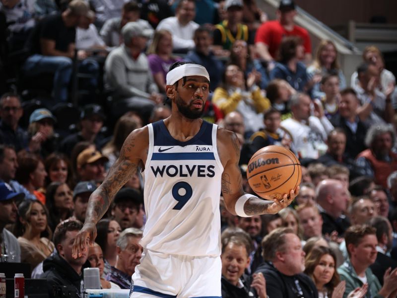 SALT LAKE CITY, UT - MARCH 18: Nickeil Alexander-Walker #9 of the Minnesota Timberwolves handles the ball during the game against the Utah Jazz on March 18, 2024 at Delta Center in Salt Lake City, Utah. NOTE TO USER: User expressly acknowledges and agrees that, by downloading and or using this Photograph, User is consenting to the terms and conditions of the Getty Images License Agreement. Mandatory Copyright Notice: Copyright 2024 NBAE (Photo by Melissa Majchrzak/NBAE via Getty Images)