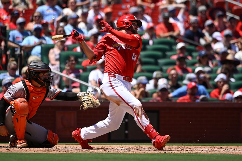 Jun 23, 2024; St. Louis, Missouri, USA; St. Louis Cardinals right fielder Alec Burleson (41) hits an RBI single against the San Francisco Giants in the first inning at Busch Stadium. Mandatory Credit: Joe Puetz-USA TODAY Sports