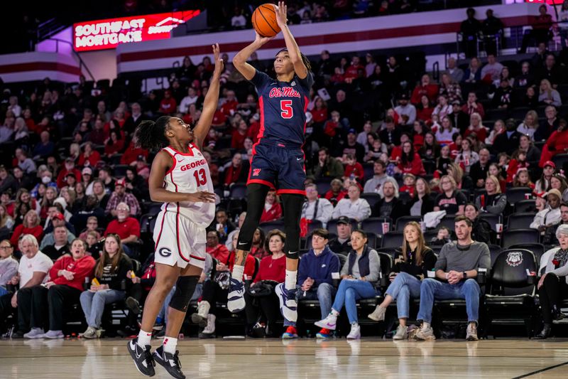 Jan 21, 2024; Athens, Georgia, USA; Ole Miss Rebels forward Snudda Collins (5) shoots over Georgia Bulldogs guard Stefanie Ingram (13) during the second half at Stegeman Coliseum. Mandatory Credit: Dale Zanine-USA TODAY Sports