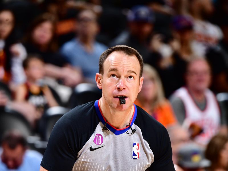PHOENIX, AZ - APRIL 9: NBA referee Josh Tiven #58 officiates the game between the LA Clippers and the Phoenix Suns on April 9, 2023 at Footprint Center in Phoenix, Arizona. NOTE TO USER: User expressly acknowledges and agrees that, by downloading and or using this photograph, user is consenting to the terms and conditions of the Getty Images License Agreement. Mandatory Copyright Notice: Copyright 2023 NBAE (Photo by Barry Gossage/NBAE via Getty Images)
