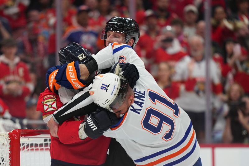 Jun 10, 2024; Sunrise, Florida, USA; Florida Panthers defenseman Brandon Montour (62) and Edmonton Oilers forward Evander Kane (91) fight during the third period in game two of the 2024 Stanley Cup Final at Amerant Bank Arena. Mandatory Credit: Jim Rassol-USA TODAY Sports