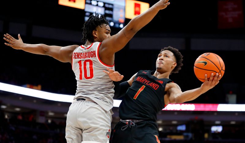 Mar 1, 2023; Columbus, Ohio, USA;  Maryland Terrapins guard Jahmir Young (1) looks to score as Ohio State Buckeyes forward Brice Sensabaugh (10) defends during the first half at Value City Arena. Mandatory Credit: Joseph Maiorana-USA TODAY Sports