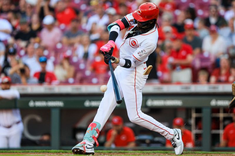 May 21, 2024; Cincinnati, Ohio, USA; Cincinnati Reds shortstop Elly De La Cruz (44) hits a single against the San Diego Padres in the first inning at Great American Ball Park. Mandatory Credit: Katie Stratman-USA TODAY Sports