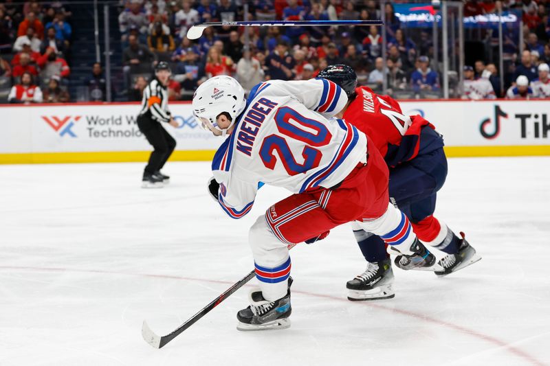 Oct 29, 2024; Washington, District of Columbia, USA; New York Rangers left wing Chris Kreider (20) breaks his stick while shooting the puck as Washington Capitals right wing Tom Wilson (43) defends in the second period at Capital One Arena. Mandatory Credit: Geoff Burke-Imagn Images