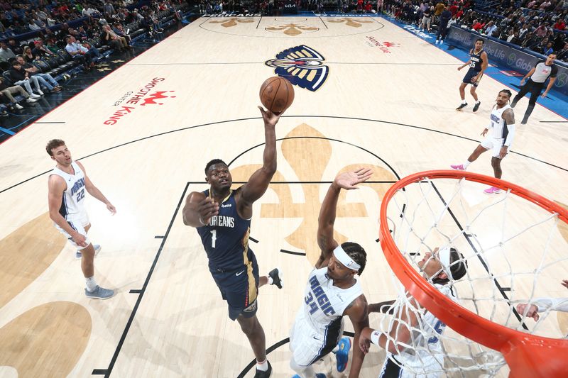 NEW ORLEANS, LA - APRIL 3:  Zion Williamson #1 of the New Orleans Pelicans drives to the basket during the game against the Orlando Magic on April 3, 2024 at the Smoothie King Center in New Orleans, Louisiana. NOTE TO USER: User expressly acknowledges and agrees that, by downloading and or using this Photograph, user is consenting to the terms and conditions of the Getty Images License Agreement. Mandatory Copyright Notice: Copyright 2024 NBAE (Photo by Layne Murdoch Jr./NBAE via Getty Images)