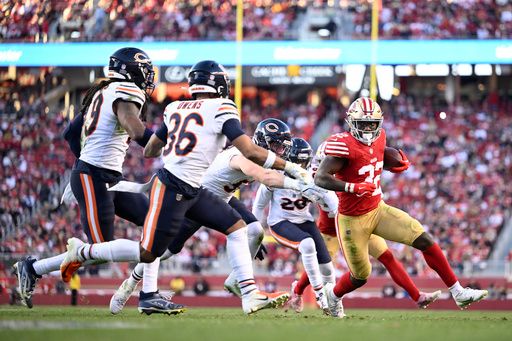 San Francisco 49ers running back Patrick Taylor Jr. (32) runs against the Chicago Bears during the second half of an NFL football game in Santa Clara, Calif., Sunday, Dec. 8, 2024. (AP Photo/Eakin Howard)