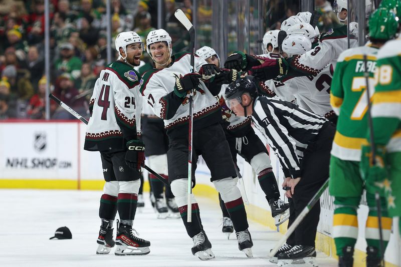 Jan 13, 2024; Saint Paul, Minnesota, USA; Arizona Coyotes center Nick Bjugstad (17) celebrates his hat-trick against the Minnesota Wild during the second period at Xcel Energy Center. Mandatory Credit: Matt Krohn-USA TODAY Sports