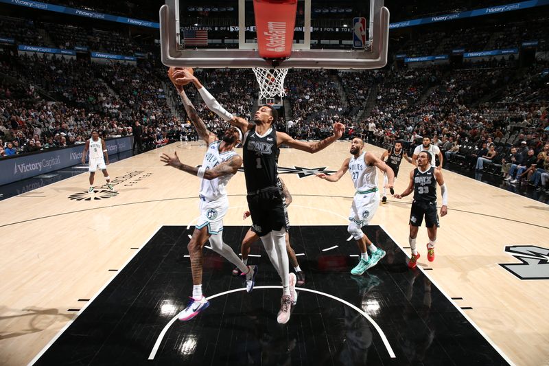 SAN ANTONIO, TX - JANUARY 27: Victor Wembanyama #1 of the San Antonio Spurs blocks a shot during the game against the Minnesota Timberwolves on January 27, 2024 at the Frost Bank Center in San Antonio, Texas. NOTE TO USER: User expressly acknowledges and agrees that, by downloading and or using this photograph, user is consenting to the terms and conditions of the Getty Images License Agreement. Mandatory Copyright Notice: Copyright 2024 NBAE (Photos by David Sherman/NBAE via Getty Images)