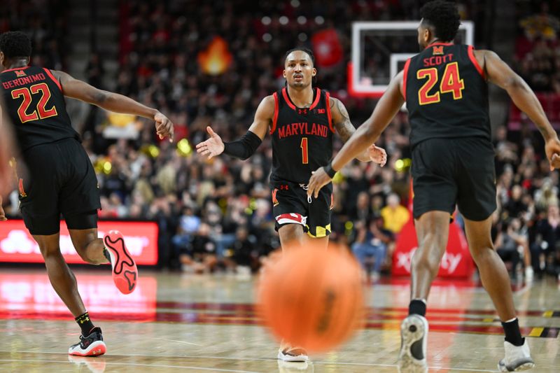 Jan 27, 2024; College Park, Maryland, USA;  Maryland Terrapins guard Jahmir Young (1) celebrates with forward Jordan Geronimo (22) and  forward Donta Scott (24) after making a three point basket during the second half at Xfinity Center. Mandatory Credit: Tommy Gilligan-USA TODAY Sports