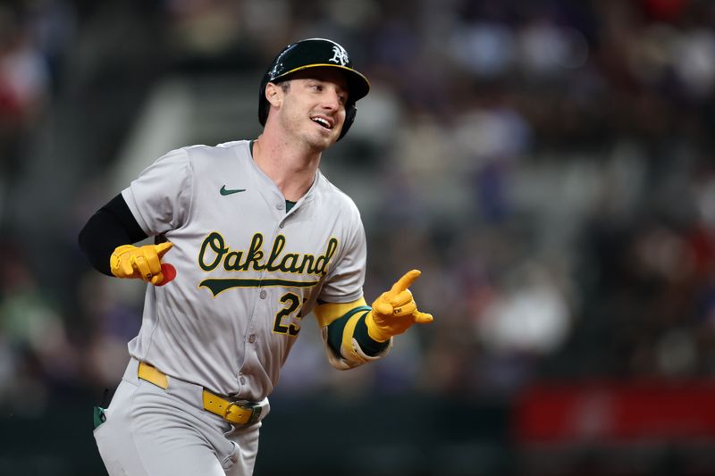 Aug 30, 2024; Arlington, Texas, USA; Oakland Athletics outfielder Brent Rooker (25) reacts as he rounds the bases after hitting a home run against the Texas Rangers in the seventh inning at Globe Life Field. Mandatory Credit: Tim Heitman-USA TODAY Sports