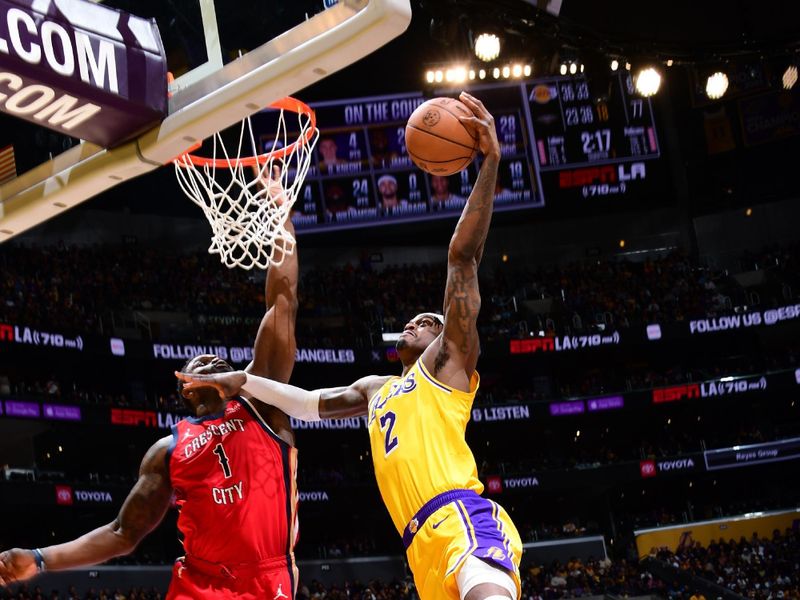 LOS ANGELES, CA - MARCH 4:  Jarred Vanderbilt #2 of the Los Angeles Lakers drives to the basket during the game against the New Orleans Pelicans on March 4, 2025 at Crypto.Com Arena in Los Angeles, California. NOTE TO USER: User expressly acknowledges and agrees that, by downloading and/or using this Photograph, user is consenting to the terms and conditions of the Getty Images License Agreement. Mandatory Copyright Notice: Copyright 2025 NBAE (Photo by Adam Pantozzi/NBAE via Getty Images)