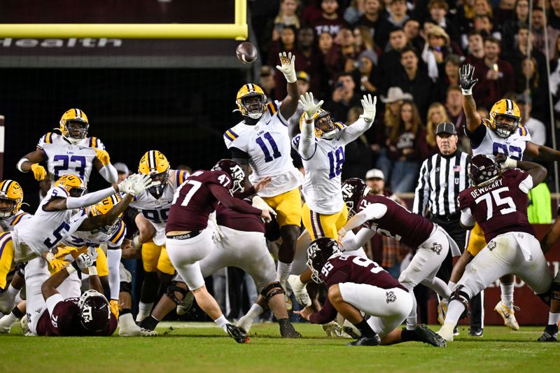 Nov 26, 2022; College Station, Texas, USA; Texas A&M Aggies place kicker Randy Bond (47) kicks a field goal against the LSU Tigers during the second quarter at Kyle Field. Mandatory Credit: Jerome Miron-USA TODAY Sports