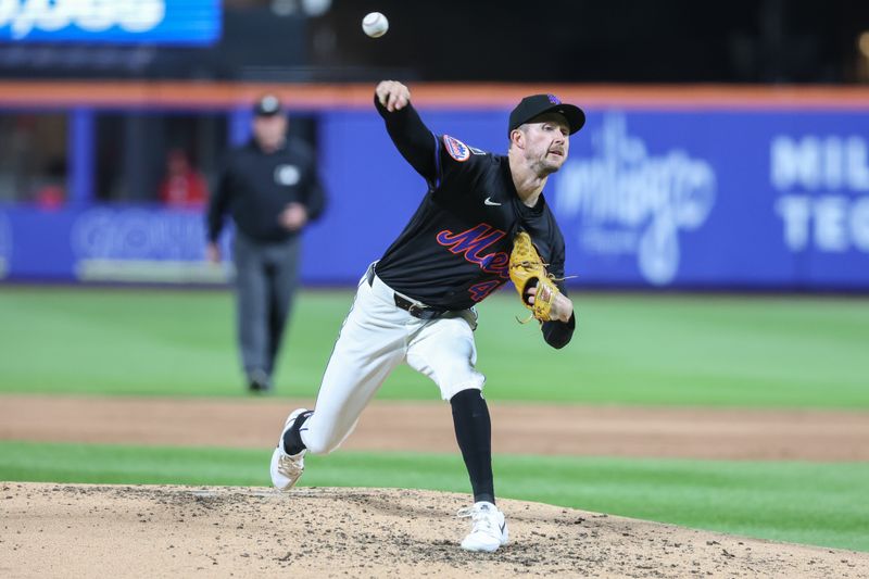 Apr 22, 2025; New York City, New York, USA;  New York Mets starting pitcher Griffin Canning (46) pitches in the third inning against the Philadelphia Phillies at Citi Field. Mandatory Credit: Wendell Cruz-Imagn Images