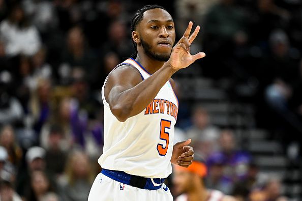 SALT LAKE CITY, UTAH - DECEMBER 13: Immanuel Quickley #5 of the New York Knicks celebrates a three point basket during the second half of a game against the Utah Jazz at Delta Center on December 13, 2023 in Salt Lake City, Utah. NOTE TO USER: User expressly acknowledges and agrees that, by downloading and or using this photograph, User is consenting to the terms and conditions of the Getty Images License Agreement. (Photo by Alex Goodlett/Getty Images)