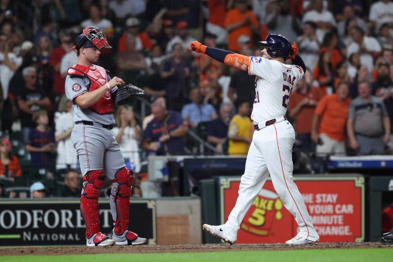 Jul 29, 2025; Houston, Texas, USA; Houston Astros catcher Yainer Diaz (21) reacts after hitting a home run during the fourth inning against the Washington Nationals at Daikin Park. Mandatory Credit: Troy Taormina-Imagn Images
