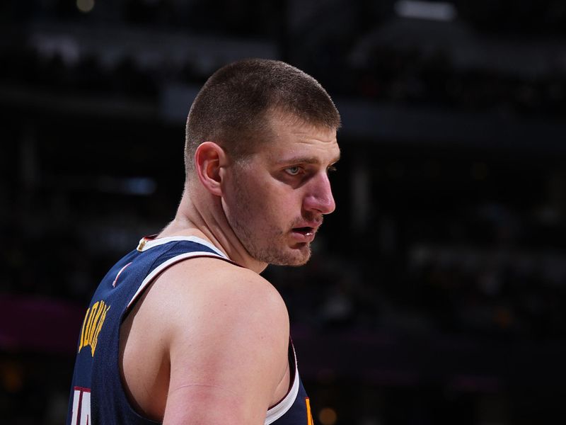 DENVER, CO - FEBRUARY 22: Nikola Jokic #15 of the Denver Nuggets handles the ball during the game against the Washington Wizards on February 22, 2024 at the Ball Arena in Denver, Colorado. NOTE TO USER: User expressly acknowledges and agrees that, by downloading and/or using this Photograph, user is consenting to the terms and conditions of the Getty Images License Agreement. Mandatory Copyright Notice: Copyright 2024 NBAE (Photo by Garrett Ellwood/NBAE via Getty Images)