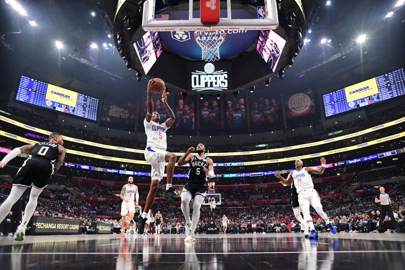 LOS ANGELES, CA - MARCH 10: Bones Hyland #5 of the LA Clippers shoots the ball during the game against the Milwaukee Bucks on March 10, 2024 at Crypto.Com Arena in Los Angeles, California. NOTE TO USER: User expressly acknowledges and agrees that, by downloading and/or using this Photograph, user is consenting to the terms and conditions of the Getty Images License Agreement. Mandatory Copyright Notice: Copyright 2024 NBAE (Photo by Adam Pantozzi/NBAE via Getty Images)