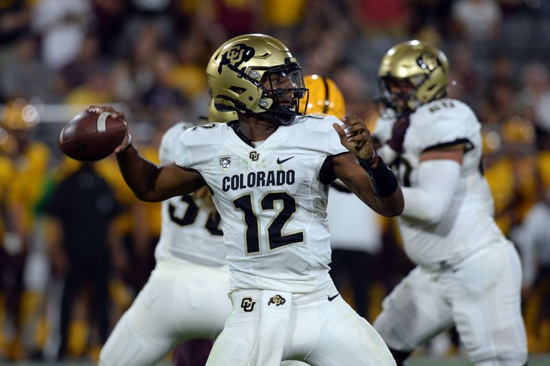 Sep 25, 2021; Tempe, Arizona, USA; Colorado Buffaloes quarterback Brendon Lewis (12) passes the ball against the Arizona State Sun Devils during the first half at Sun Devil Stadium. Mandatory Credit: Joe Camporeale-USA TODAY Sports