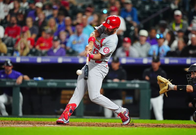 Sep 24, 2024; Denver, Colorado, USA; St. Louis Cardinals designated hitter Matt Carpenter (13) doubles in the seventh inning against the Colorado Rockies at Coors Field. Mandatory Credit: Ron Chenoy-Imagn Images