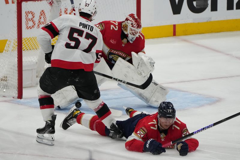 Feb 20, 2024; Sunrise, Florida, USA; Florida Panthers goaltender Sergei Bobrovsky (72) makes a save on a shot by Ottawa Senators center Shane Pinto (57) during the second period at Amerant Bank Arena. Mandatory Credit: Jim Rassol-USA TODAY Sports