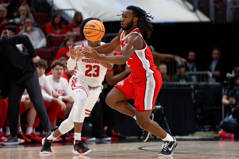 Mar 8, 2023; Chicago, IL, USA; Ohio State Buckeyes guard Bruce Thornton (2) steals the ball from Wisconsin Badgers guard Chucky Hepburn (23) during the first half at United Center. Mandatory Credit: Kamil Krzaczynski-USA TODAY Sports